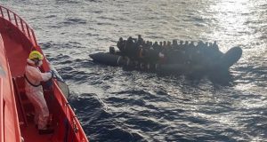 Photo shows the rescue of a baby born at sea on a crowded migrant boat