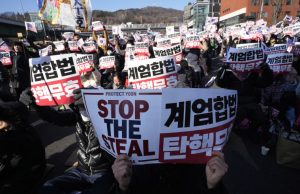Impeached South Korean president defies arrest in tense standoff