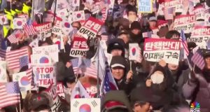Supporters rally as South Korean authorities fail to arrest president